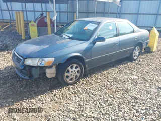 2000 Toyota Camry CE z VIN JT2BG22K5Y0476098, wystawiony jako IAAI lot #42200385 z przebiegiem Nie podano mil oraz . Historia ofert i sprzedaży dostępna na DreamBid. Obrazek 2.