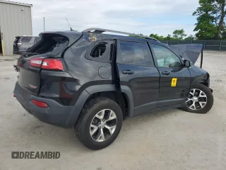 2014 Jeep Cherokee Trailhawk with VIN 1C4PJMBB2EW173458, listed as a Copart auction lot 56146355 with Not provided miles and Salvage title. Bid and sale history available at DreamBid. Image 3.