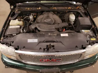 2003 GMC Sierra Denali z VIN 2GTFK69U531392799, wystawiony jako Copart lot #78530804 z przebiegiem 179 365 mil mil oraz Tytuł czysty. Historia ofert i sprzedaży dostępna na DreamBid. Obrazek 11.