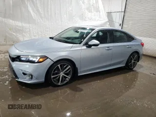 2022 Honda Civic Sedan Touring with VIN 2HGFE1F99NH309560, listed as a Copart auction lot 53485585 with 75,320 mi miles and Clean Title. Bid and sale history available at carsss.com. Image 1.