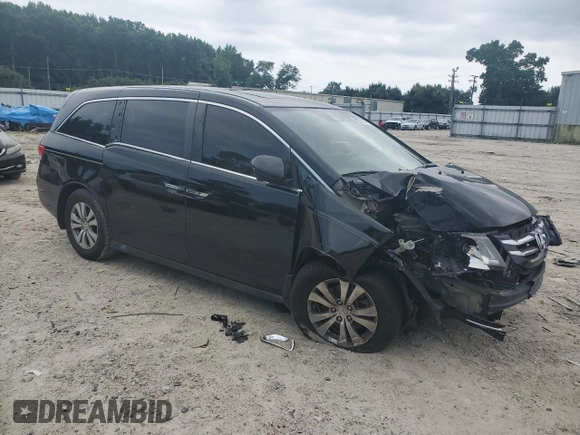 2014 Honda Odyssey EX-L with VIN 5FNRL5H68EB098207, listed as a Copart auction lot 66700024 with 161,701 mi miles and Salvage Title. Bid and sale history available at DreamBid. Image 4.