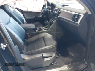 2022 Volkswagen Atlas SE z VIN 1V2KP2CA5NC509929, wystawiony jako IAAI lot #42231410 z przebiegiem 84 678 mil mil oraz . Historia ofert i sprzedaży dostępna na DreamBid. Obrazek 5.