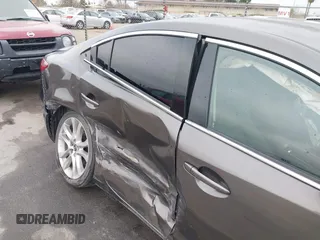 2016 Mazda 6 i Touring with VIN JM1GJ1V52G1473330, listed as a IAAI auction lot 41657684 with 138,064 mi miles and . Bid and sale history available at DreamBid. Image 6.