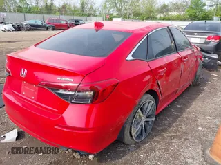 2023 Honda Civic Touring z VIN 2HGFE1F90PH309059, wystawiony jako IAAI lot #42146353 z przebiegiem Nie podano mil oraz . Historia ofert i sprzedaży dostępna na DreamBid. Obrazek 4.