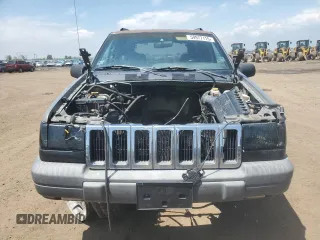 1997 Jeep Grand Cherokee Laredo z VIN 1J4GZ58S6VC636803, wystawiony jako Copart lot #59977115 z przebiegiem Nie podano mil oraz Szkoda całkowita • Salvage title. Historia ofert i sprzedaży dostępna na DreamBid. Obrazek 5.