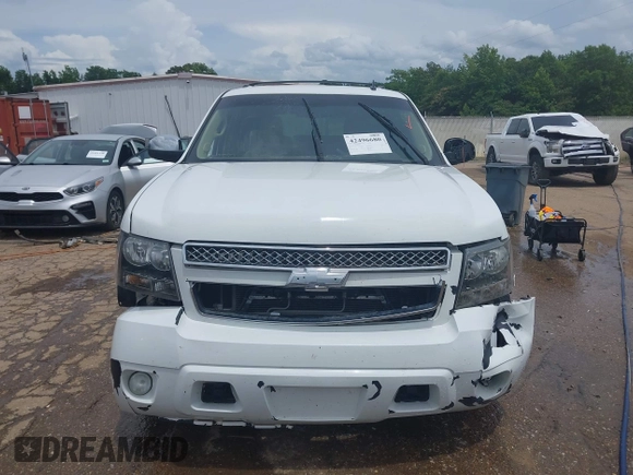 2013 Chevrolet Tahoe LS with VIN 1GNSCAE01DR260799, listed as a IAAI auction lot 42496680 with 199,276 mi miles and . Bid and sale history available at DreamBid. Image 13.