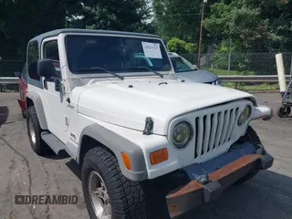 2005 Jeep Wrangler Sport z VIN 1J4FA49S05P320673, wystawiony jako IAAI lot #42533767 z przebiegiem 197 434 mil mil oraz . Historia ofert i sprzedaży dostępna na DreamBid. Obrazek 1.