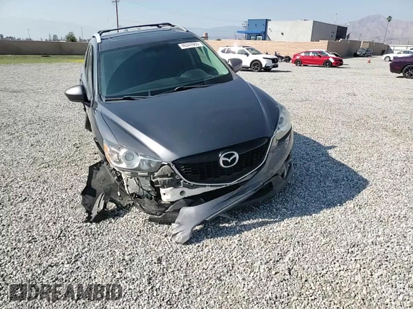 2014 Mazda CX-5 Touring with VIN JM3KE4CY6E0375084, listed as a Copart auction lot 46344065 with 143,828 mi miles and Salvage Title. Bid and sale history available at carsss.com. Image 11.