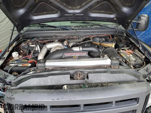 2005 Ford F-350 XL z VIN 1FTWX31P55EC91379, wystawiony jako Copart lot #47813565 z przebiegiem 142 729 mil mil oraz Szkoda całkowita • Salvage title. Historia ofert i sprzedaży dostępna na DreamBid. Obrazek 11.