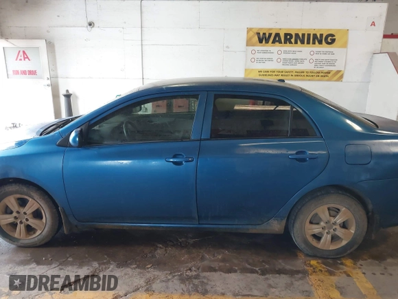 2010 Toyota Corolla with VIN JTDBU4EE7AJ063262, listed as a IAAI auction lot 41703421 with 292,776 mi miles. Bid and sale history available at carsss.com. Image 14.