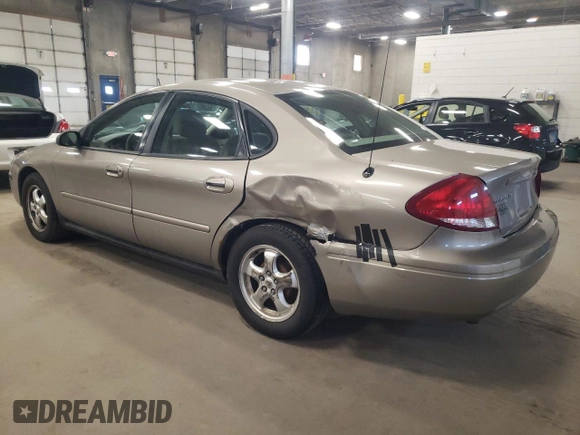 2005 Ford Taurus SE with VIN 1FAFP53U15A276082, listed as a Copart auction lot 52015285 with 103,479 mi miles and Salvage Title. Bid and sale history available at carsss.com. Image 2.
