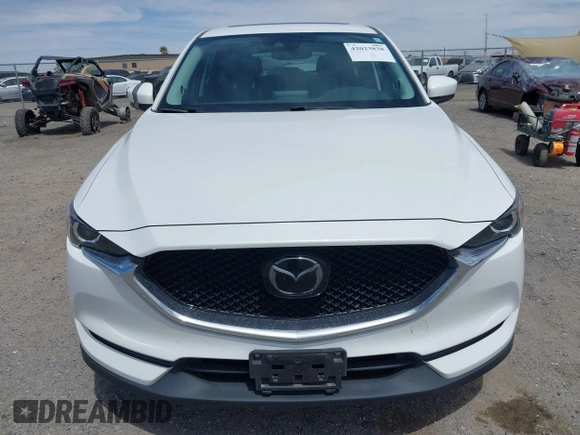 2018 Mazda CX-5 Touring with VIN JM3KFACM3J0381122, listed as a IAAI auction lot 42023838 with 76,121 mi miles. Bid and sale history available at carsss.com. Image 12.
