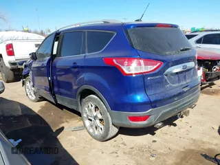 2016 Ford Escape Titanium with VIN 1FMCU0J95GUC41632, listed as a IAAI auction lot 41692040 with 144,834 mi miles. Bid and sale history available at carsss.com. Image 3.