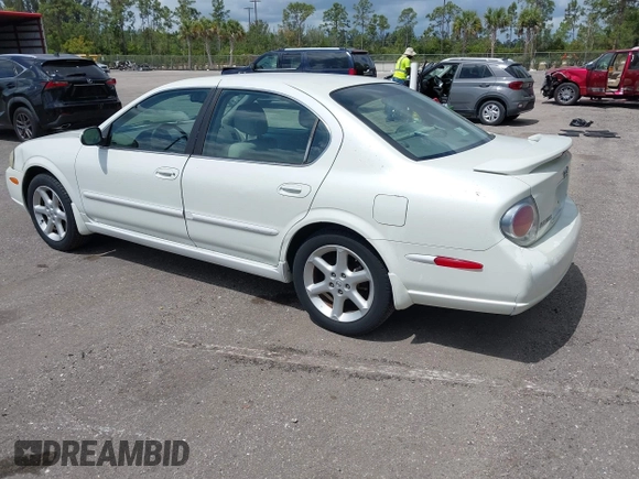 2003 Nissan Maxima SE z VIN JN1DA31DX3T501453, wystawiony jako IAAI lot #42116346 z przebiegiem 127 364 mil mil oraz . Historia ofert i sprzedaży dostępna na DreamBid. Obrazek 3.