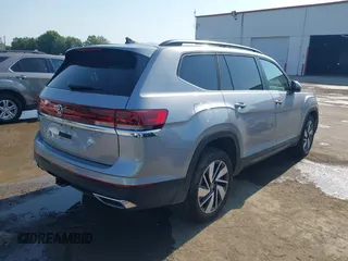 2025 Volkswagen Atlas SE with VIN 1V2WR2CA2SC508079, listed as a IAAI auction lot 42312651 with 10,436 mi miles and . Bid and sale history available at DreamBid. Image 4.