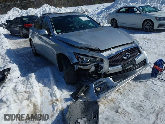 2015 Infiniti Q50 Premium z VIN JN1BV7ARXFM395132, wystawiony jako IAAI lot #41618895 z przebiegiem 96 951 mil mil oraz . Historia ofert i sprzedaży dostępna na DreamBid. Obrazek 6.