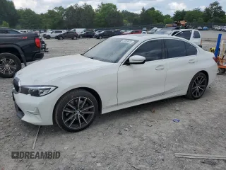 2020 BMW 3 Series 330i with VIN 3MW5R1J01L8B13902, listed as a Copart auction lot 59869625 with 54,992 mi miles and Salvage title. Bid and sale history available at DreamBid. Image 1.
