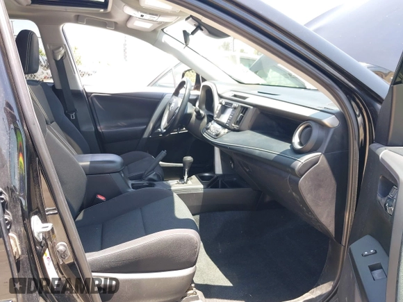 2018 Toyota RAV4 XLE with VIN 2T3WFREV2JW447623, listed as a IAAI auction lot 42410168 with 84,800 mi miles and . Bid and sale history available at DreamBid. Image 5.