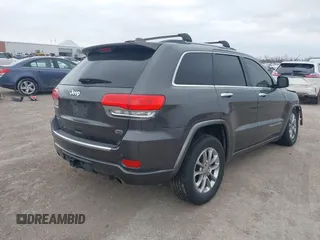 2015 Jeep Grand Cherokee Overland with VIN 1C4RJFCT3FC131122, listed as a IAAI auction lot 41513892 with 125,765 mi miles. Bid and sale history available at carsss.com. Image 4.