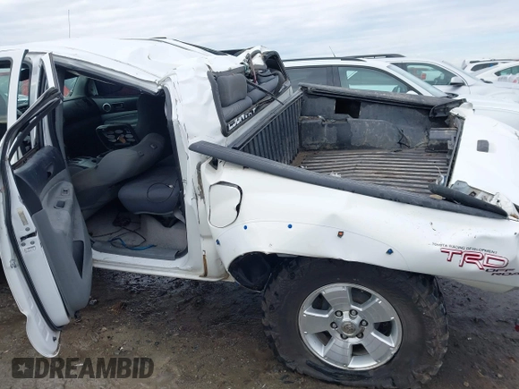 2009 Toyota Tacoma PreRunner with VIN 3TMJU62N59M082788, listed as a IAAI auction lot 41297385 with 253,581 mi miles. Bid and sale history available at carsss.com. Image 14.