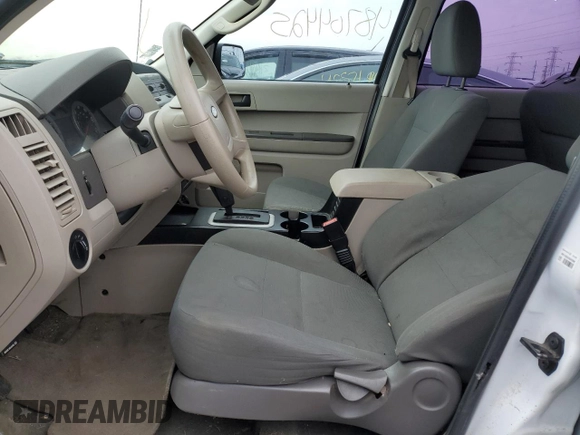 2009 Ford Escape XLS with VIN 1FMCU92729KD10213, listed as a Copart auction lot 48704425 with 114,219 mi miles and Salvage title. Bid and sale history available at DreamBid. Image 7.