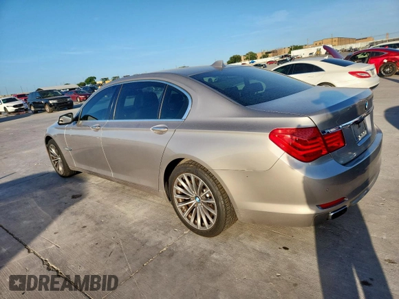 2012 BMW 7 Series 740Li with VIN WBAKB4C59CC576610, listed as a Copart auction lot 62762465 with 128,073 mi miles and Clean title. Bid and sale history available at DreamBid. Image 2.