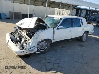 1992 Chrysler New Yorker z VIN 1C3XV66R9ND836273, wystawiony jako Copart lot #47061515 z przebiegiem 142 174 mil mil oraz Nie do naprawy. Historia ofert i sprzedaży dostępna na DreamBid. Obrazek 1.