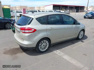 2018 Ford C-Max Hybrid SE with VIN 1FADP5AU7JL105118, listed as a IAAI auction lot 42085019 with 71,019 mi miles. Bid and sale history available at carsss.com. Image 4.