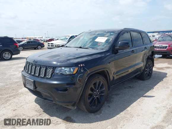 2019 Jeep Grand Cherokee Altitude with VIN 1C4RJEAG0KC857787, listed as a IAAI auction lot 42434646 with 193,968 mi miles and . Bid and sale history available at DreamBid. Image 17.