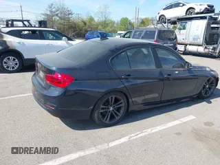 2017 BMW 3 Series 330i xDrive with VIN WBA8D9C50HA003714, listed as a IAAI auction lot 42098572 with 69,479 mi miles and . Bid and sale history available at carsss.com. Image 4.