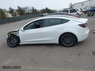 2019 Tesla Model 3 Long Range with VIN 5YJ3E1EB2KF361541, listed as a IAAI auction lot 41859373 with 54,664 mi miles. Bid and sale history available at carsss.com. Image 15.