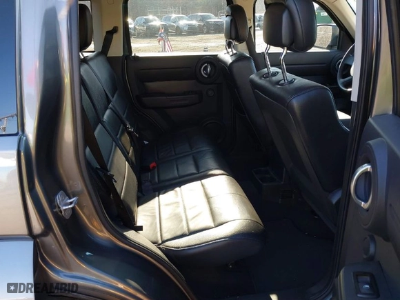 2011 Dodge Nitro Heat with VIN 1D4PU4GX9BW607188, listed as a IAAI auction lot 41100616 with 86,062 mi miles. Bid and sale history available at carsss.com. Image 8.
