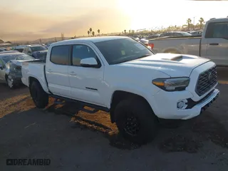 2023 Toyota Tacoma 4WD SR with VIN 3TMCZ5AN8PM647845, listed as a IAAI auction lot 41371634 with 21,917 mi miles. Bid and sale history available at carsss.com. Image 1.