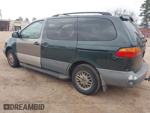 1999 Toyota Sienna LE with VIN 4T3ZF13C1XU098026, listed as a IAAI auction lot 41514367 with 314,638 mi miles. Bid and sale history available at carsss.com. Image 3.