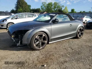 2014 Audi TT Premium Plus z VIN TRUSFAFKXE1004232, wystawiony jako Copart lot #58706175 z przebiegiem 113 835 mil mil oraz Szkody całkowita. Historia ofert i sprzedaży dostępna na DreamBid. Obrazek 1.
