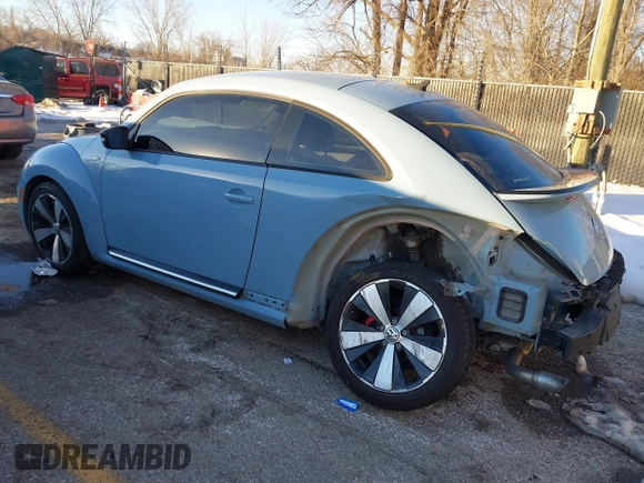 2014 Volkswagen Beetle Turbo R-Line with VIN 3VWVT7AT9EM661347, listed as a IAAI auction lot 41336295 with 61,068 mi miles and . Bid and sale history available at DreamBid. Image 3.