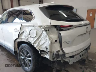 2020 Mazda CX-9 Touring z VIN JM3TCBCY8L0405360, wystawiony jako IAAI lot #41419428 z przebiegiem 69 917 mil mil oraz . Historia ofert i sprzedaży dostępna na DreamBid. Obrazek 6.