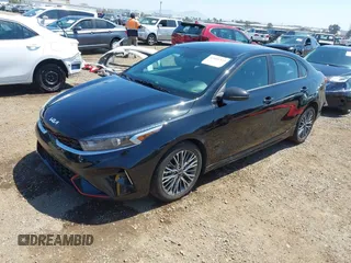 2023 Kia Forte GT-Line with VIN 3KPF54AD6PE672764, listed as a IAAI auction lot 42001535 with 18,907 mi miles. Bid and sale history available at carsss.com. Image 2.