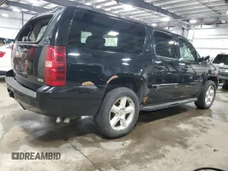 2009 Chevrolet Suburban LT w/2LT with VIN 1GNFK26319J124911, listed as a Copart auction lot 53263455 with 215,826 mi miles and Salvage Title. Bid and sale history available at carsss.com. Image 3.