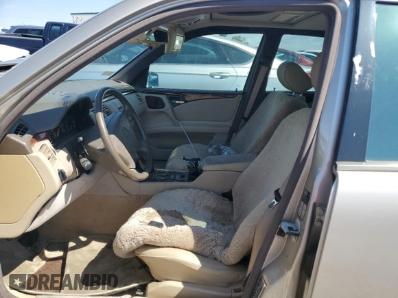 1997 Mercedes-Benz E-Class with VIN WDBJF72F2VA274233, listed as a Copart auction lot 74123554 with 80,914 mi miles and Salvage Title. Bid and sale history available at carsss.com. Image 7.