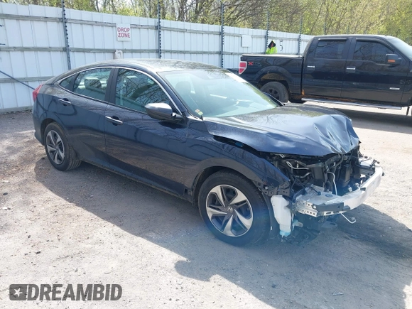 2021 Honda Civic LX z VIN 19XFC2F65ME000324, wystawiony jako IAAI lot #42137375 z przebiegiem 78 473 mil mil oraz . Historia ofert i sprzedaży dostępna na DreamBid. Obrazek 1.