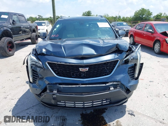 2019 Cadillac XT4 FWD Sport with VIN 1GYFZER42KF107032, listed as a IAAI auction lot 42193557 with 96,615 mi miles and . Bid and sale history available at DreamBid. Image 12.