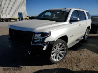 2015 Chevrolet Tahoe LT with VIN 1GNSCBKC2FR280423, listed as a Copart auction lot 87492524 with 144,648 mi miles and Salvage Title. Bid and sale history available at carsss.com. Image 1.