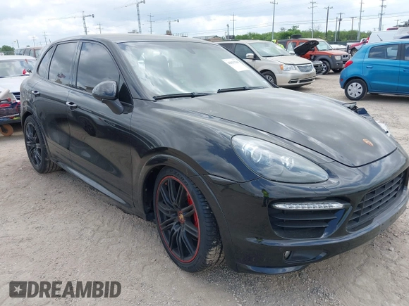 2014 Porsche Cayenne GTS with VIN WP1AD2A25ELA71350, listed as a IAAI auction lot 42031766 with 104,184 mi miles and . Bid and sale history available at DreamBid. Image 1.