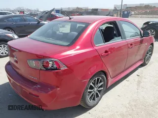 2017 Mitsubishi Lancer ES with VIN JA32U2FU6HU001322, listed as a IAAI auction lot 41813288 with 127,531 mi miles. Bid and sale history available at carsss.com. Image 4.