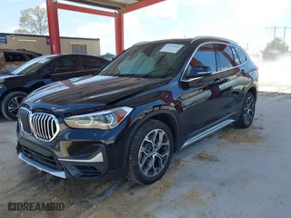 2021 BMW X1 sDrive28i with VIN WBXJG7C02M5S59010, listed as a IAAI auction lot 41933532 with 49,207 mi miles. Bid and sale history available at carsss.com. Image 17.
