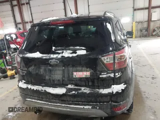 2017 Ford Escape SE with VIN 1FMCU9GD8HUE81307, listed as a IAAI auction lot 41386675 with 133,821 mi miles and . Bid and sale history available at DreamBid. Image 16.