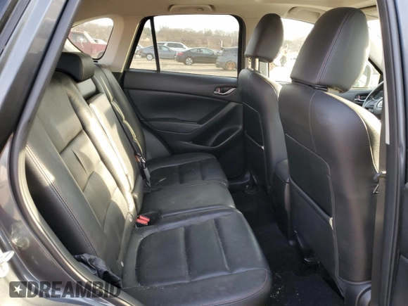 2014 Mazda CX-5 Grand Touring with VIN JM3KE4DY5E0372787, listed as a Copart auction lot 48873675 with 136,784 mi miles and Salvage Title. Bid and sale history available at carsss.com. Image 11.