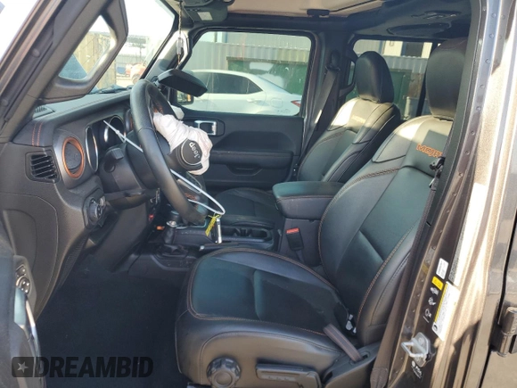 2023 Jeep Gladiator Mojave с VIN 1C6JJTEG0PL511376, выставлен на аукционе Copart как лот 52683495 с пробегом 17 813 миль миль и Списание • Salvage title. История ставок и продаж доступна на DreamBid. Изображение 7.