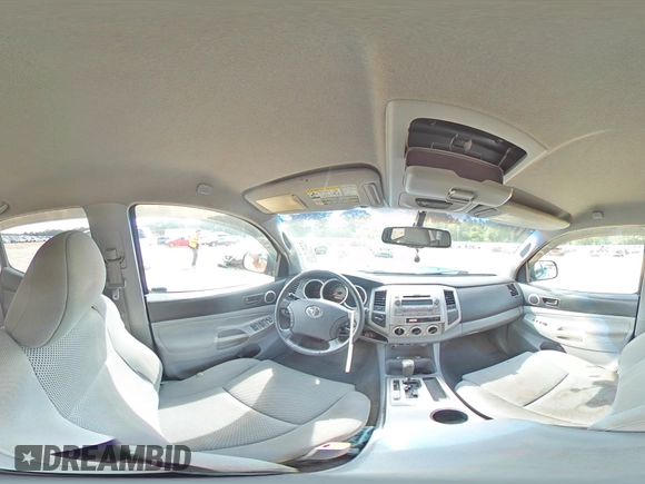 2009 Toyota Tacoma with VIN 3TMLU42N39M021727, listed as a Copart auction lot 65031095 with 200,386 mi miles and Salvage title. Bid and sale history available at DreamBid. Image 14.